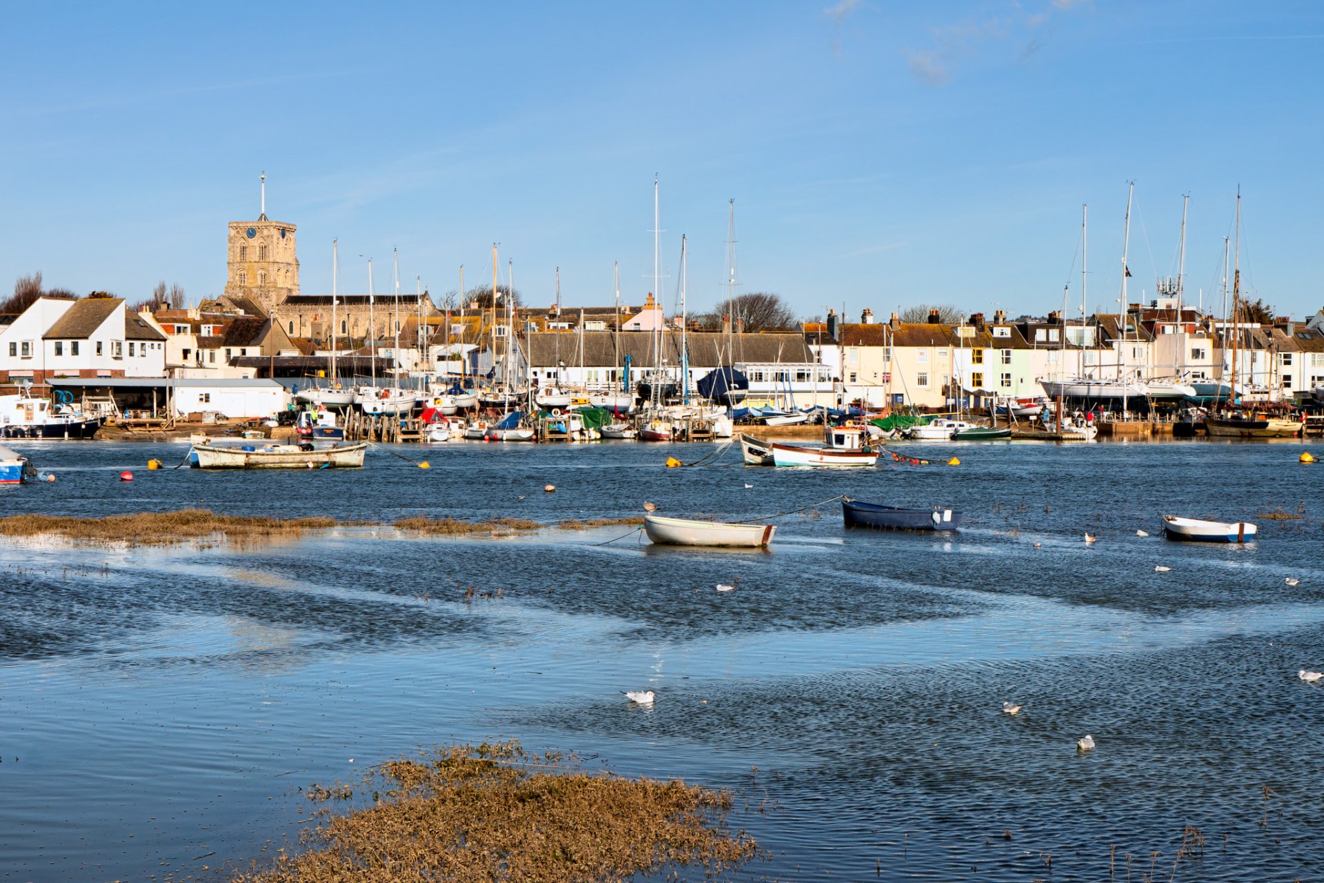The River Adur and the footbridge at Shoreham-by-Sea, with small boats on the water